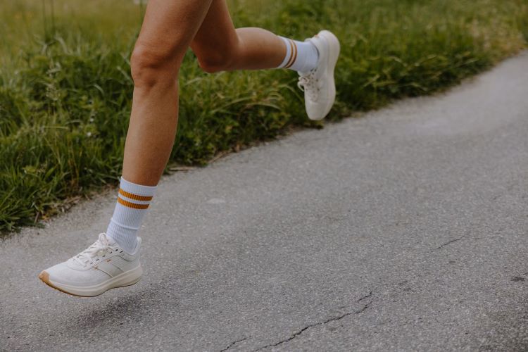 Close-up of a man's running lower legs
