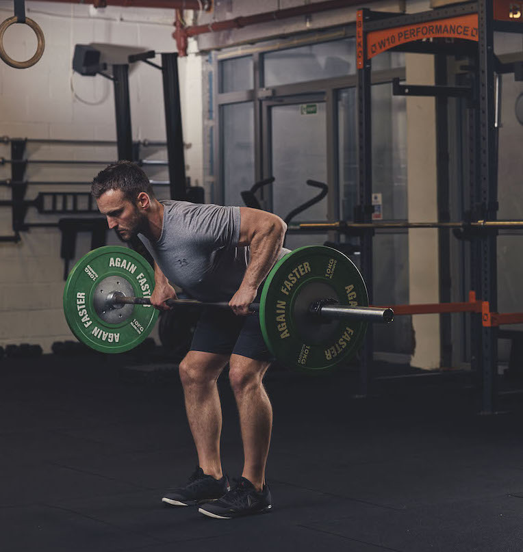 Man demonstrating a Barbell Bent-Over Row