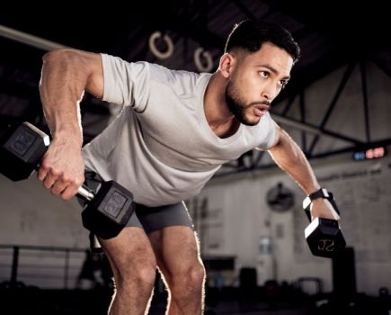 Close up of a man performing bent over row exercise