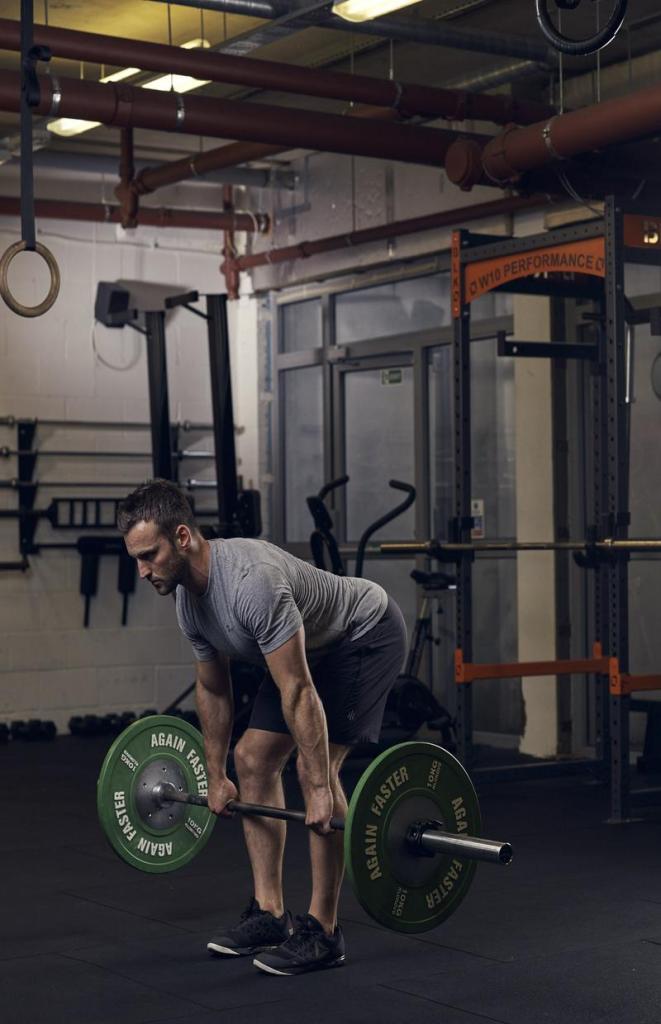 man demonstrating bent over row