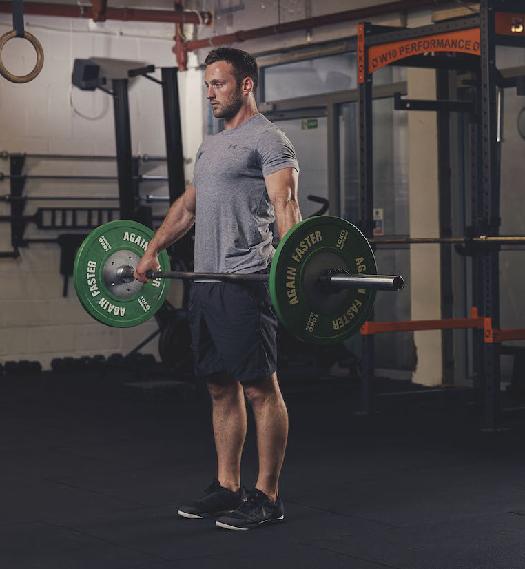 Man demonstrating a Barbell Snatch-Grip Deadlift