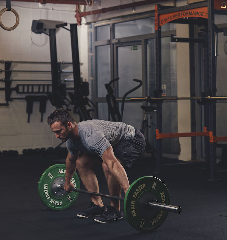Man demonstrating the Barbell Snatch-Grip Deadlift start position  